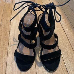 Black faux suede strappy block heel.